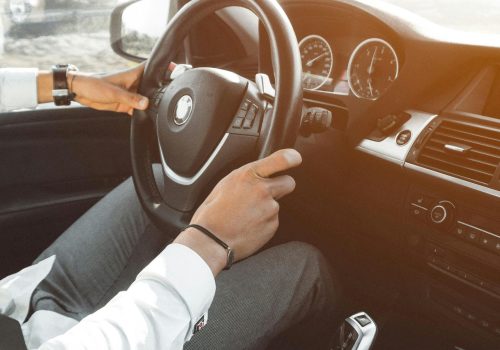 Close-up of a luxury car's interior while driving in Marrakech, Morocco.